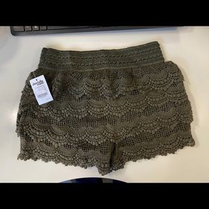 Green crochet shorts
